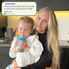 Lifestyle image of a parent holding their child while they enjoy a LittleVitz Kids Super Greens chocolate flavour drink from a reusable LittleVitz cup. The image includes a verified customer testimonial praising the chocolate taste, demonstrating how the daily greens and superfoods supplement helps children aged 3+ enjoy vitamins, minerals and plant based nutrition as part of their everyday routine.