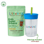 LittleVitz Kids Super Greens chocolate flavour food supplement pouch shown next to a free clear plastic travel tumbler with a blue lid and green straw, on a white background with a small award badge and 'Free Cup Included' text.